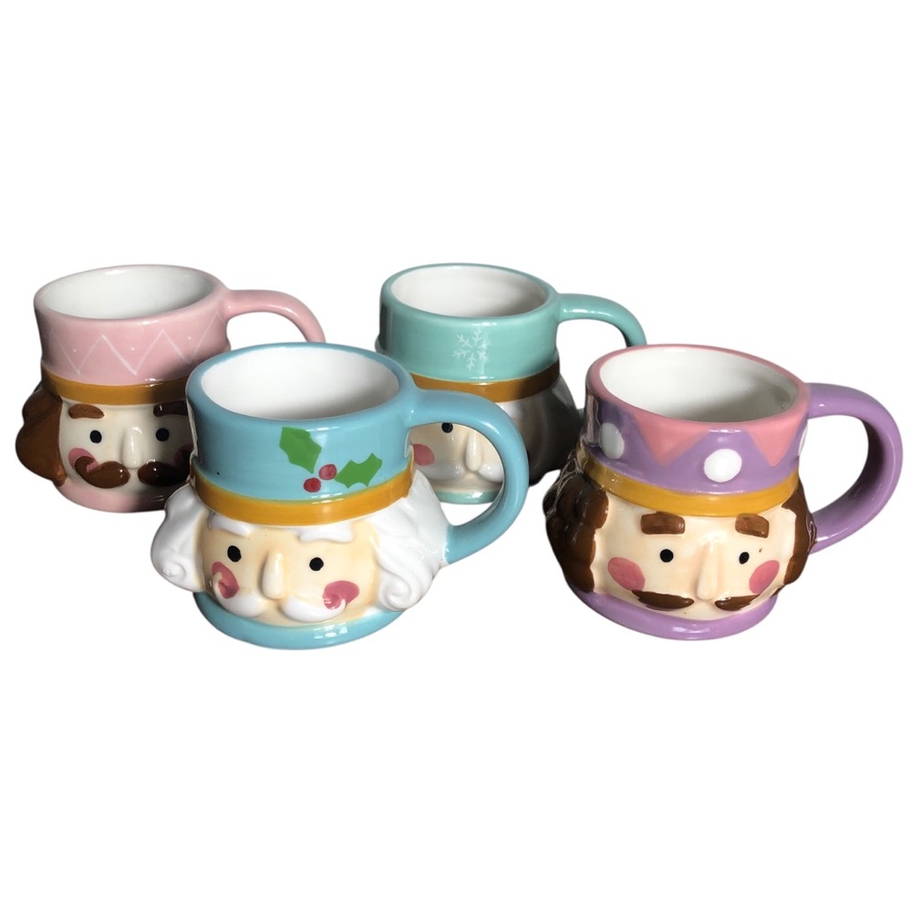 Lang mini nutcracker espresso ceramic cups with handles.